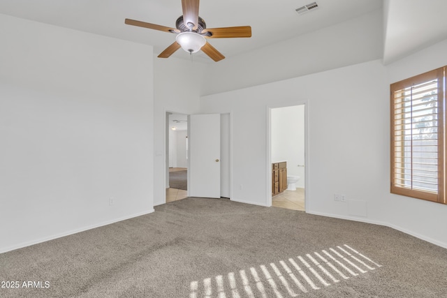 carpeted empty room with ceiling fan