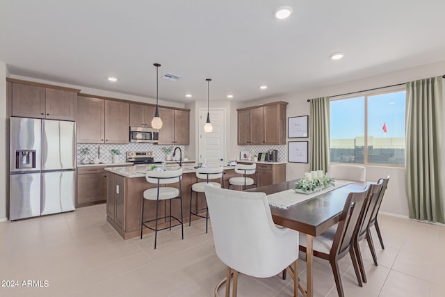 dining space featuring recessed lighting, visible vents, and light tile patterned floors