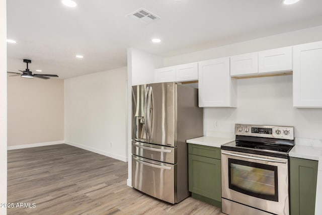 308 W Oraibi Dr, Phoenix, AZ 85027 - kitchen featuring appliances with stainless steel finishes, green cabinets, ceiling fan, white cabinets, and recessed lighting