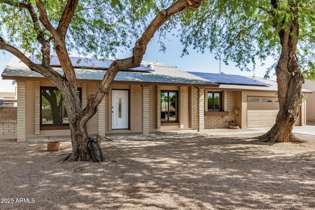 308 W Oraibi Dr, Phoenix, AZ 85027 - single story home featuring a garage and solar panels