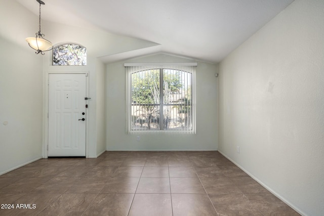 entrance foyer with vaulted ceiling