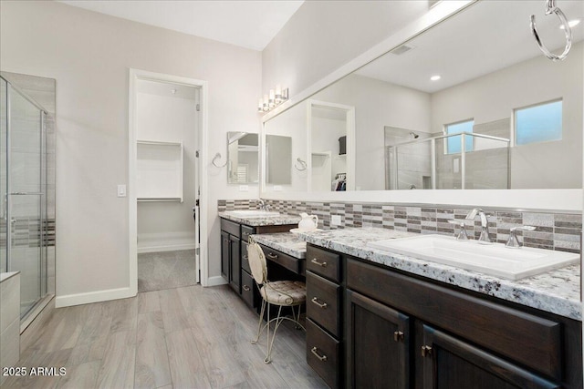 29344 N 132nd Ln, Peoria, AZ 85383 - full bath with a stall shower, vanity, decorative backsplash, and wood finished floors