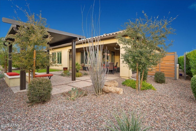 29344 N 132nd Ln, Peoria, AZ 85383 - back of property featuring stucco siding and a patio