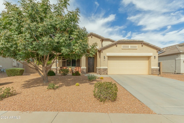 view of front of property featuring a garage