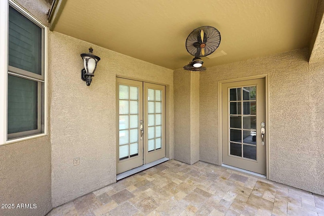 view of patio featuring french doors