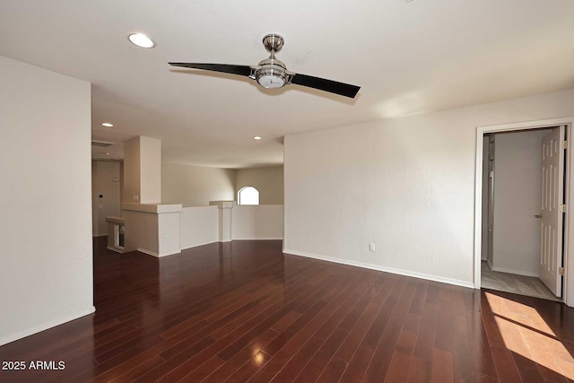 unfurnished living room with a ceiling fan, baseboards, wood finished floors, and recessed lighting