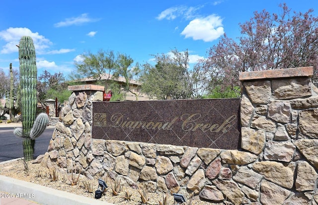 view of community sign