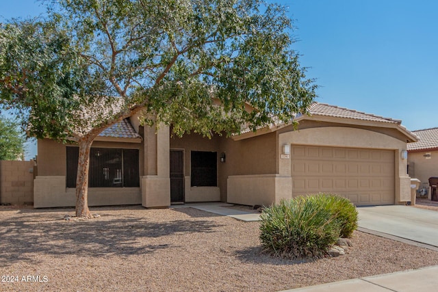 view of front of home with a garage