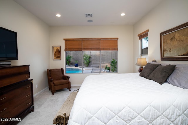bedroom featuring baseboards, visible vents, recessed lighting, and light colored carpet