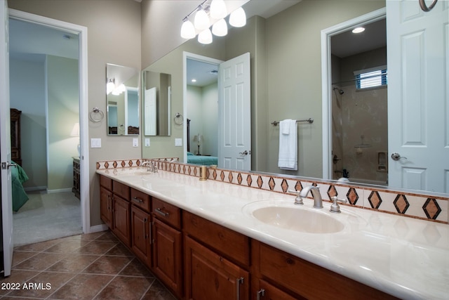 full bath featuring double vanity, bathing tub / shower combination, a sink, and ensuite bath