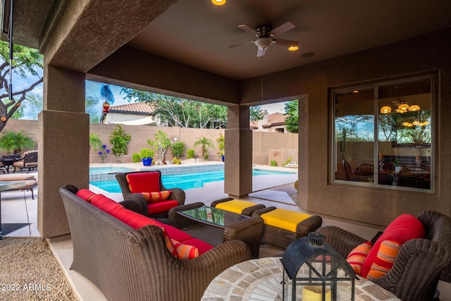 view of patio / terrace with outdoor dining area, a fenced backyard, an outdoor hangout area, a fenced in pool, and a ceiling fan