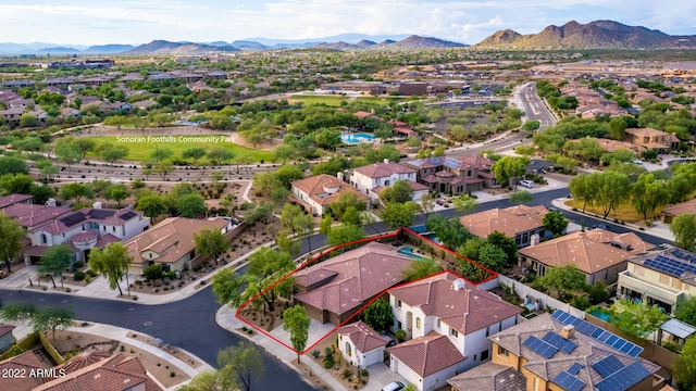 birds eye view of property featuring a residential view and a mountain view