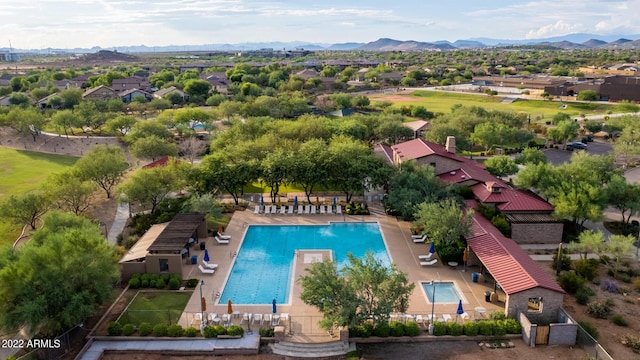 birds eye view of property featuring a mountain view and a residential view