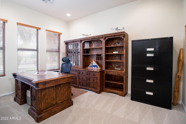 office space featuring baseboards, visible vents, recessed lighting, and light colored carpet
