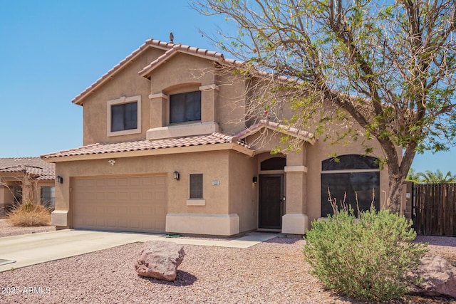 9646 N 94th Ave, Peoria, AZ 85345 - mediterranean / spanish-style house with stucco siding, a tiled roof, concrete driveway, and an attached garage