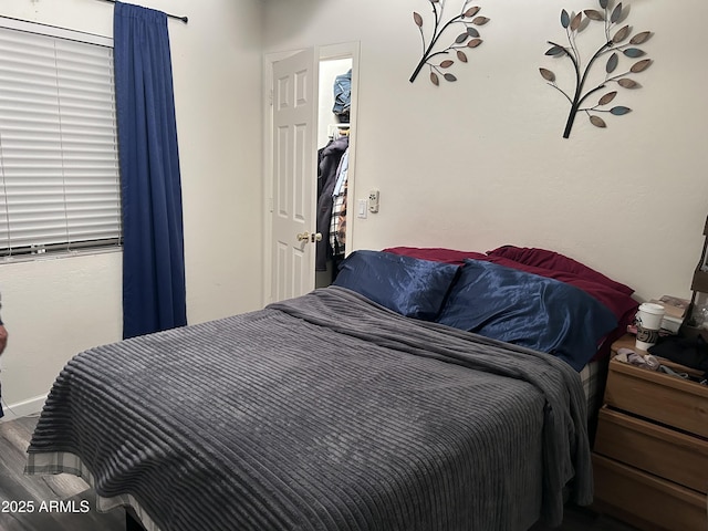 bedroom featuring hardwood / wood-style flooring