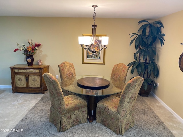 dining area with a chandelier