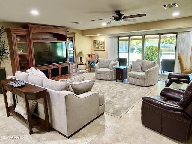 living room featuring ceiling fan