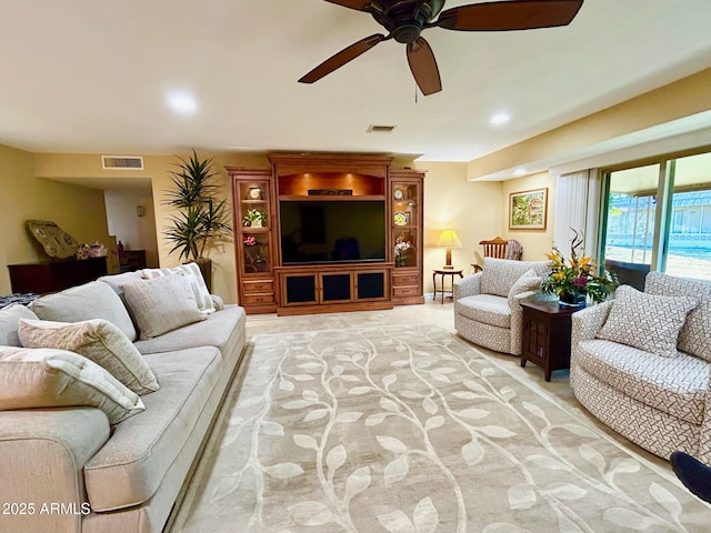 living room featuring ceiling fan