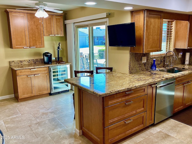 kitchen with dishwasher, sink, decorative backsplash, light stone counters, and beverage cooler