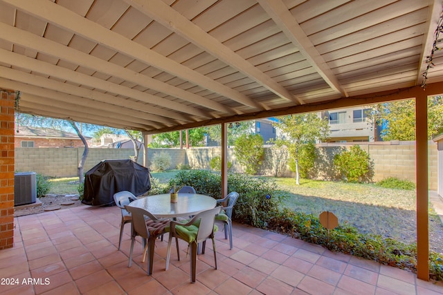 view of patio featuring grilling area and central air condition unit