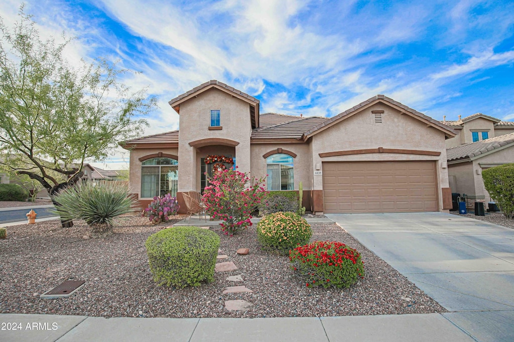 view of front of home with a garage