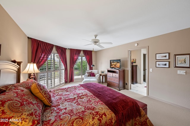 carpeted bedroom with baseboards and ceiling fan