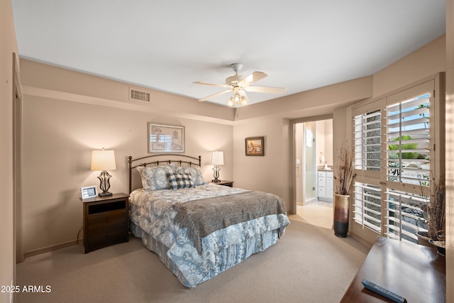 bedroom with visible vents, a ceiling fan, baseboards, and carpet floors