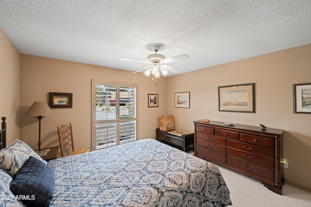 bedroom with light carpet, a textured ceiling, access to exterior, and a ceiling fan