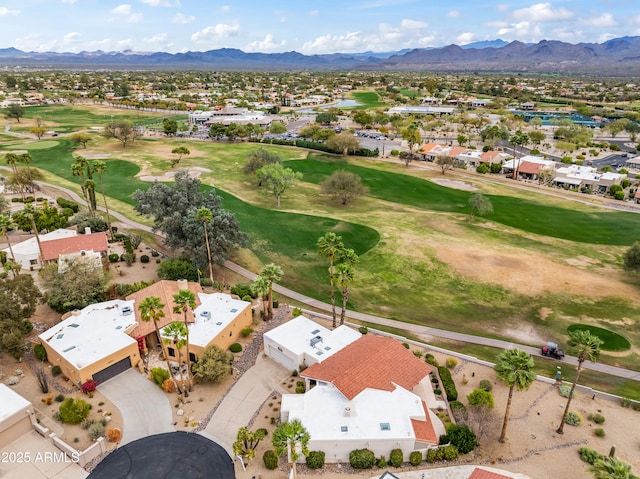 drone / aerial view featuring a mountain view and view of golf course