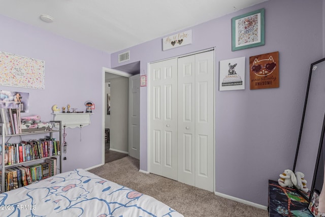 3741 W Poinsettia Dr, Phoenix, AZ 85029 - carpeted bedroom featuring a closet and baseboards