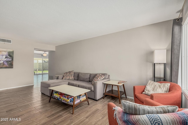 3741 W Poinsettia Dr, Phoenix, AZ 85029 - living area with light wood-type flooring and baseboards