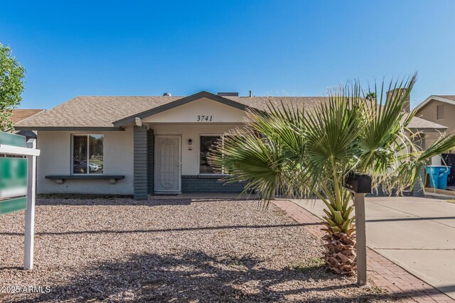 3741 W Poinsettia Dr, Phoenix, AZ 85029 - view of front of property featuring roof with shingles and stucco siding