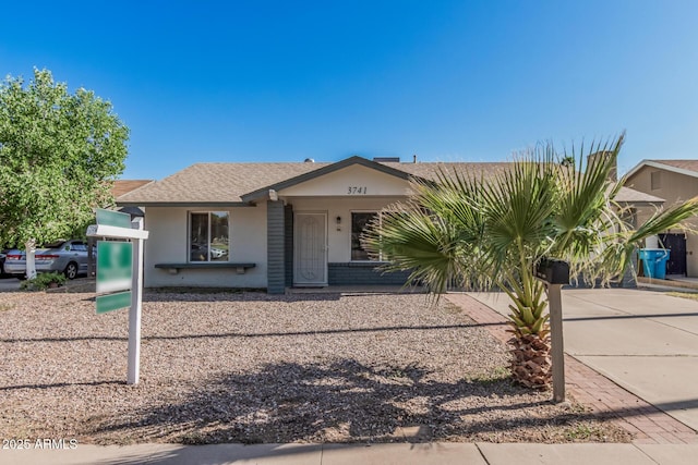 3741 W Poinsettia Dr, Phoenix, AZ 85029 - view of front of property featuring stucco siding and a shingled roof