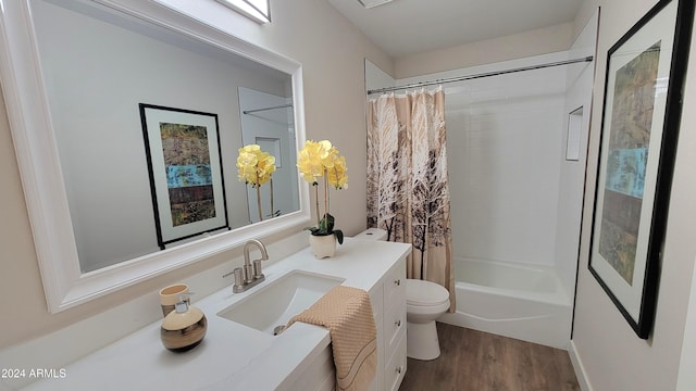 full bathroom with wood-type flooring, vanity, toilet, and shower / bathtub combination with curtain