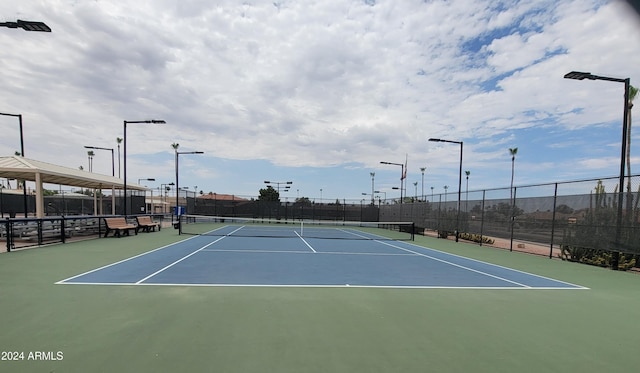 view of tennis court with basketball court