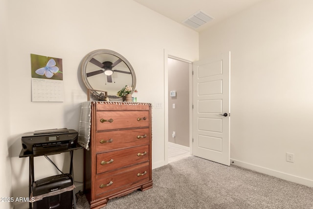 interior space featuring light colored carpet