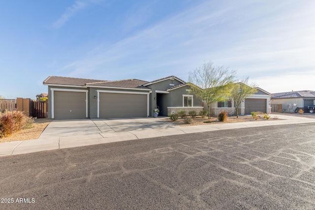 ranch-style home featuring a garage