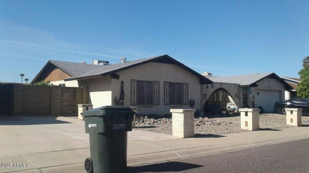 3935 W Muriel Dr, Glendale, AZ 85308 - single story home with a garage, stucco siding, and driveway