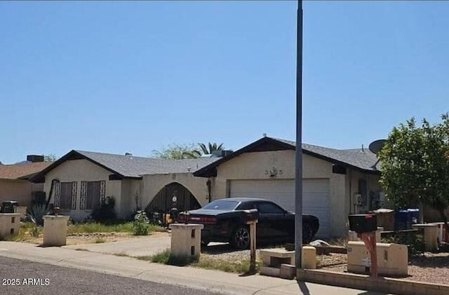3935 W Muriel Dr, Glendale, AZ 85308 - ranch-style house with a garage and concrete driveway