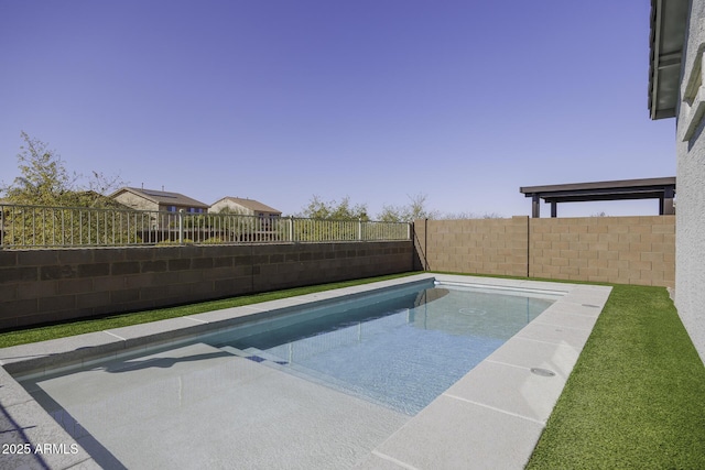 view of swimming pool featuring a fenced backyard and a fenced in pool