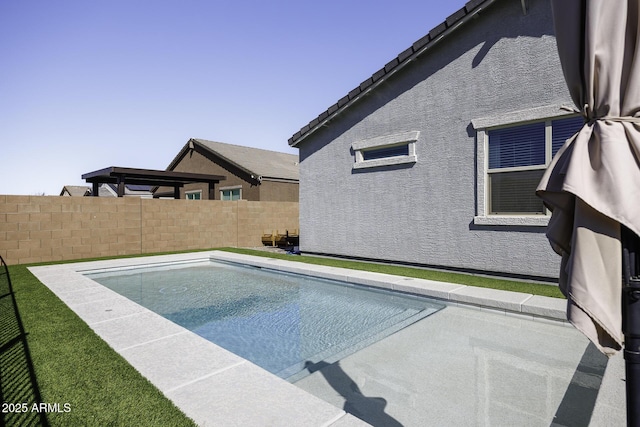 view of pool with fence and a fenced in pool