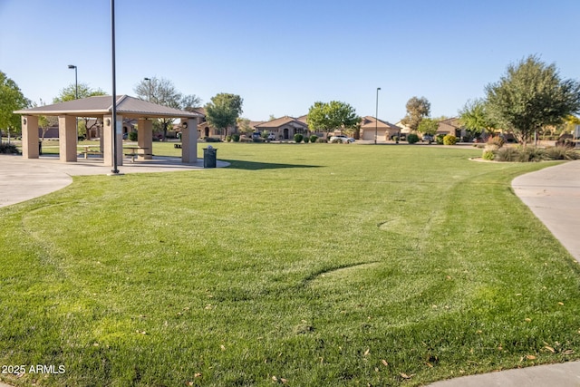 view of community with a gazebo and a yard