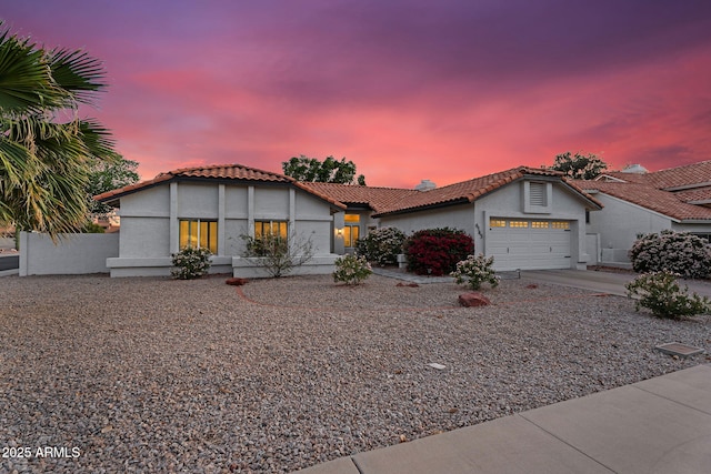 6145 E Snowdon St, Mesa, AZ 85215 - view of front of home featuring stucco siding, an attached garage, a chimney, a tile roof, and concrete driveway
