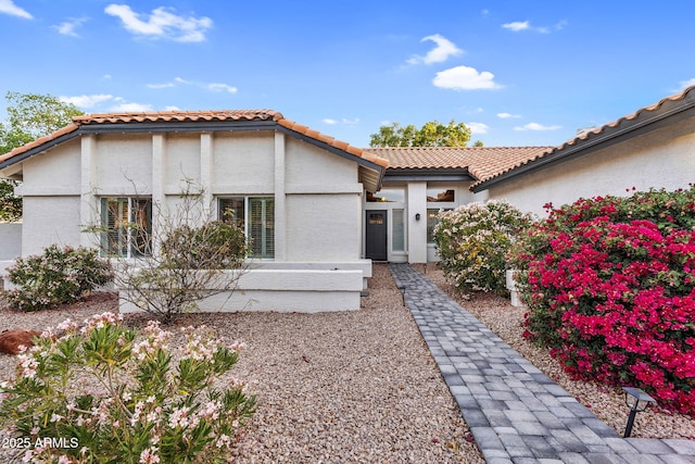 6145 E Snowdon St, Mesa, AZ 85215 - rear view of property featuring a tile roof and stucco siding