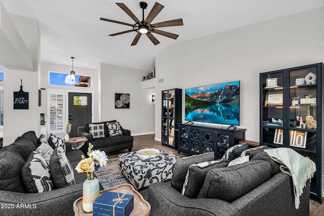 6145 E Snowdon St, Mesa, AZ 85215 - living room with lofted ceiling, wood finished floors, a ceiling fan, and baseboards