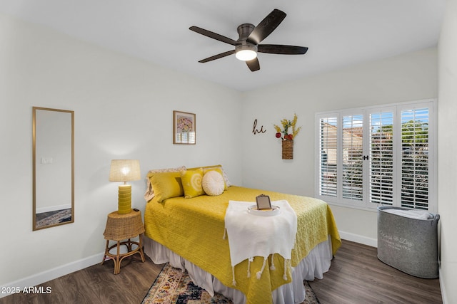 6145 E Snowdon St, Mesa, AZ 85215 - bedroom with wood finished floors, baseboards, and a ceiling fan
