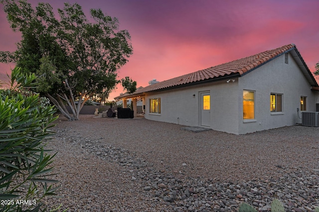 6145 E Snowdon St, Mesa, AZ 85215 - rear view of house featuring central AC, stucco siding, and a tile roof