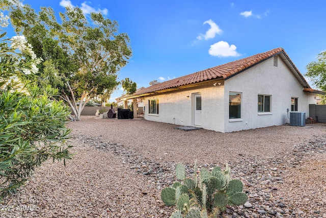 6145 E Snowdon St, Mesa, AZ 85215 - rear view of property with central air condition unit, stucco siding, and a tile roof