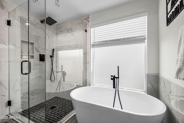 6145 E Snowdon St, Mesa, AZ 85215 - bathroom featuring a freestanding bath and a marble finish shower